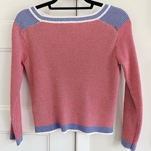 Crew neck rib knit sweater. True to size fit.
